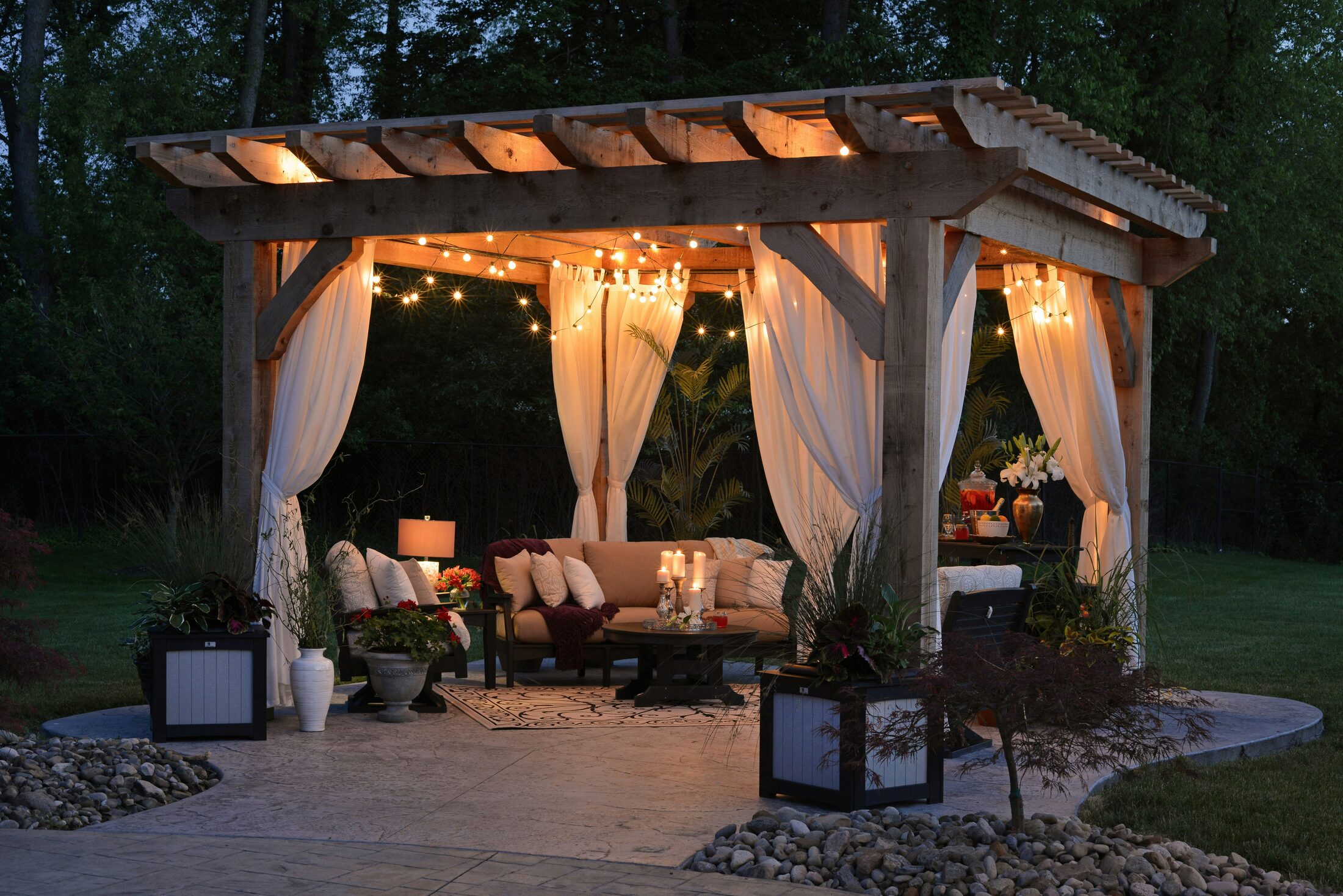 Timber pergola with outdoor seating and lighting